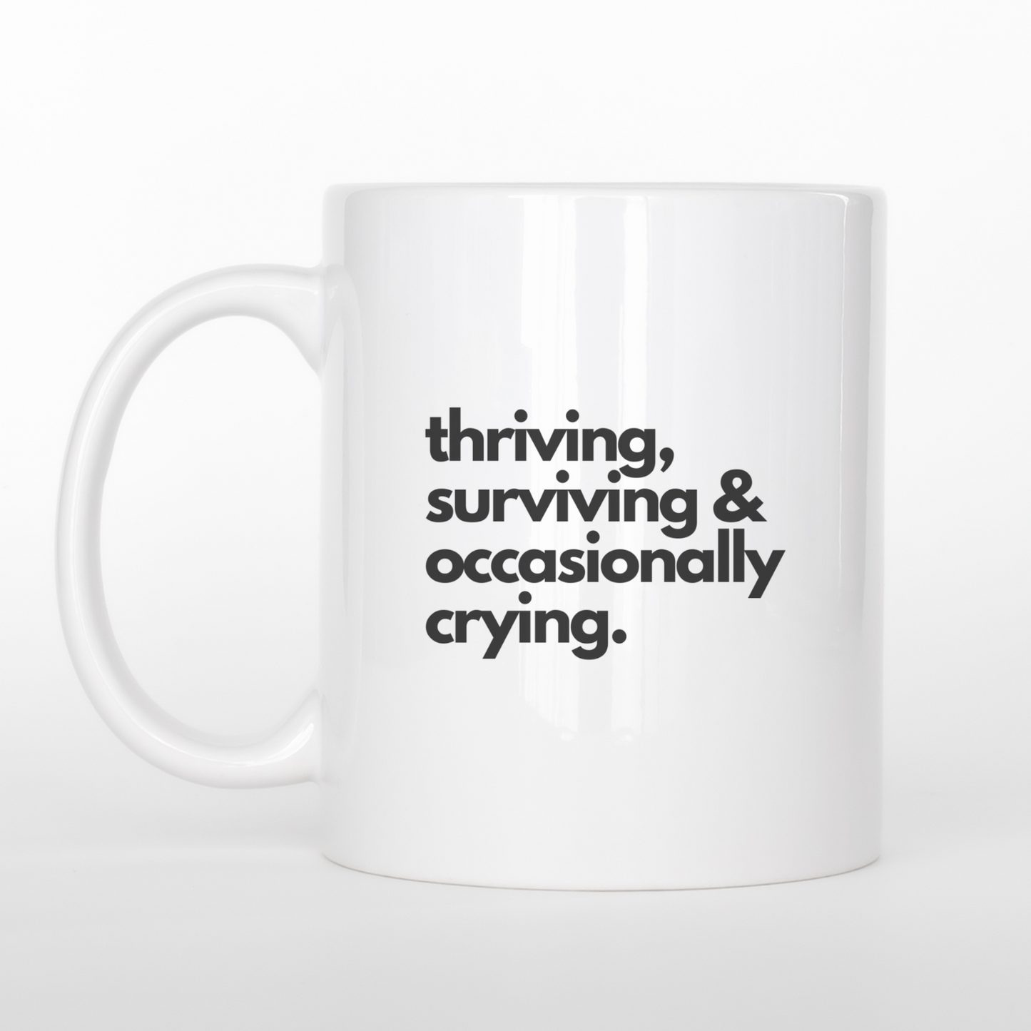 Funny Coffee Mug – “Thriving, Surviving, and Occasionally Crying” | Ceramic Mug for Self-Care & Laughs